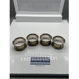 A Lot of four antique silver plated I.D napkin rings.