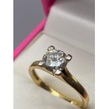 A Ladies 18ct gold and single diamond, 1ct Ring. Ring size O. 'Starlight' Fully hallmarked.