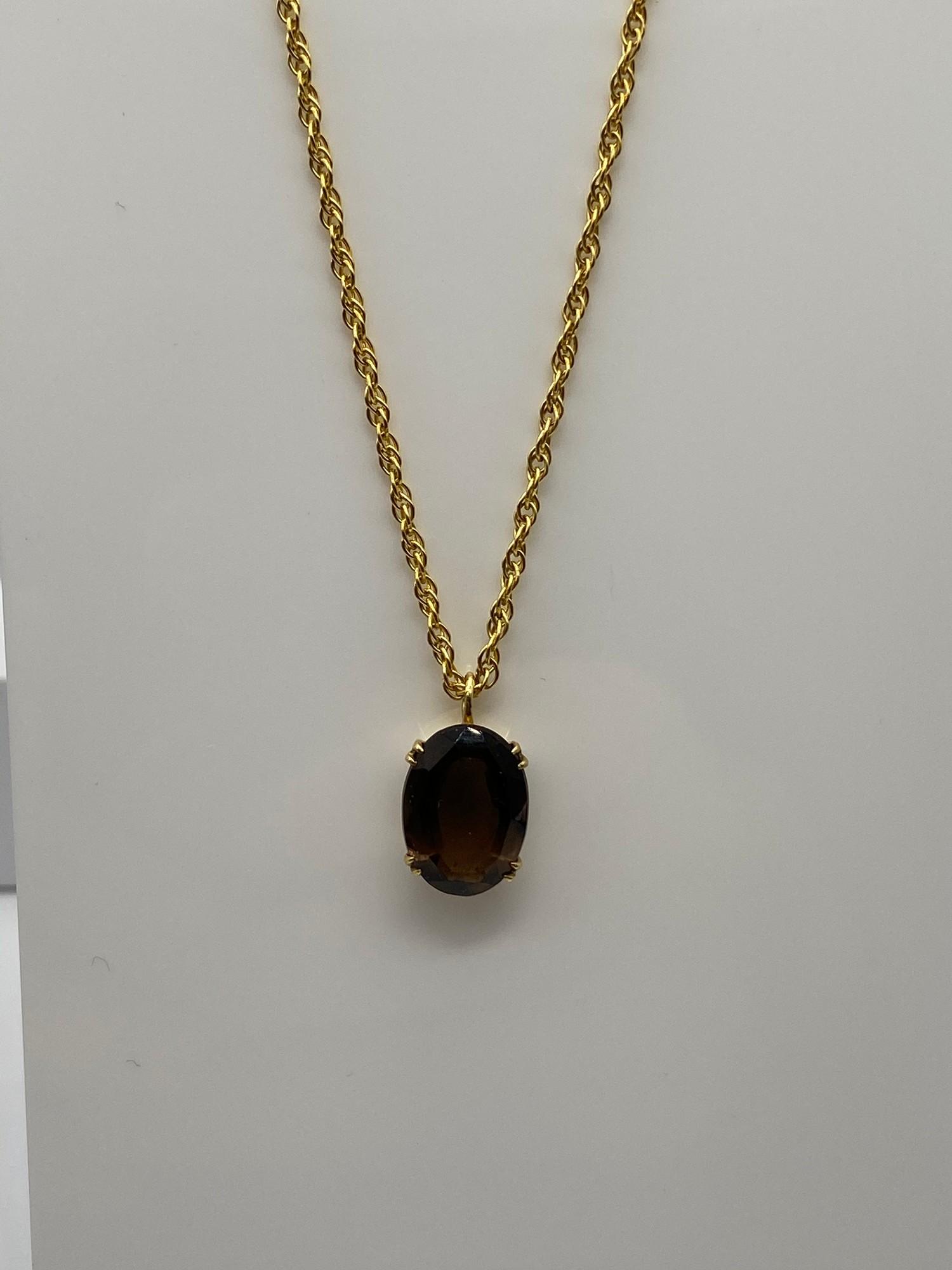 A Ladies 9ct gold necklace together with a 9ct gold and Smokey Quartz stone pendant. [Chain 45cm - Image 2 of 4