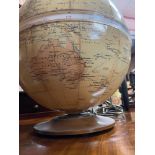 A Vintage Philips 12 inch Terrestrial Globe. Sat upon a wooden base.