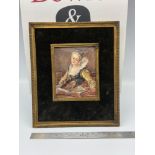 A Regency miniature portrait painting of a young woman reading. Signed D' Fragonard. Fitted with a