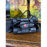 A Set of Leica Ultravid binoculars with carry case
