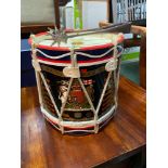 A Regiment military ice bucket in the shape of a drum, Together with plated tongs.