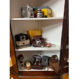 A Collection of various cameras which includes Brownie cine camera, Ensign box camera and various