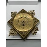 Antique brass wall clock engraved 'Cor Herbert London Bridge' Designed with a French clock movement.