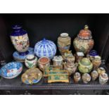 A Large quantity of Japanese and Chinese porcelain wares which includes vases and preserve pots.