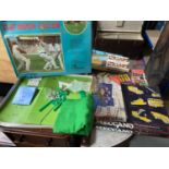 A Selection of vintage games which includes Subbuteo cricket, Meccano set, North sea oil game, The