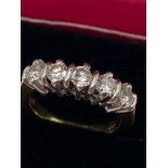 An 18ct gold five stone diamond ring. [Ring size M][0.85CT in total][7 grams]