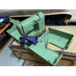 A Vintage Elna Supermatie sewing machine with carry case