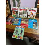 8 Various vintage Football annuals and books. Includes Football Book 1985, Tiger Roy of the