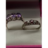 Two Silver ladies dress rings, One designed with three large Amethyst stones and the other with