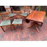 Pine Ducal drop end dining table, Four chairs and two matching carver chairs.
