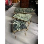 A Vintage gilt brass and marble nest of tables. Designed with Claw foot supports
