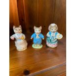 A Lot of Three Beswick 'Beatrix Potter' Figures which includes Tabitha Twitchett, Cousin Ribby & Tom
