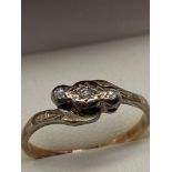 A Ladies 18ct and Platinum diamond ring. [Ring size K] [2 Grams]