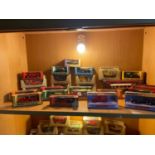 A Shelf of Dinky and Matchbox boxed car models