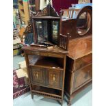 A Victorian Rose wood corner cabinet designed with ornate urn inlays. Comes with mirror top