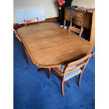 Antique mahogany dining table with single leaf, two chairs and matching two carvers