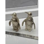 A Pair of unusual silver plated penguin condiment pots. [7.5cm in height]