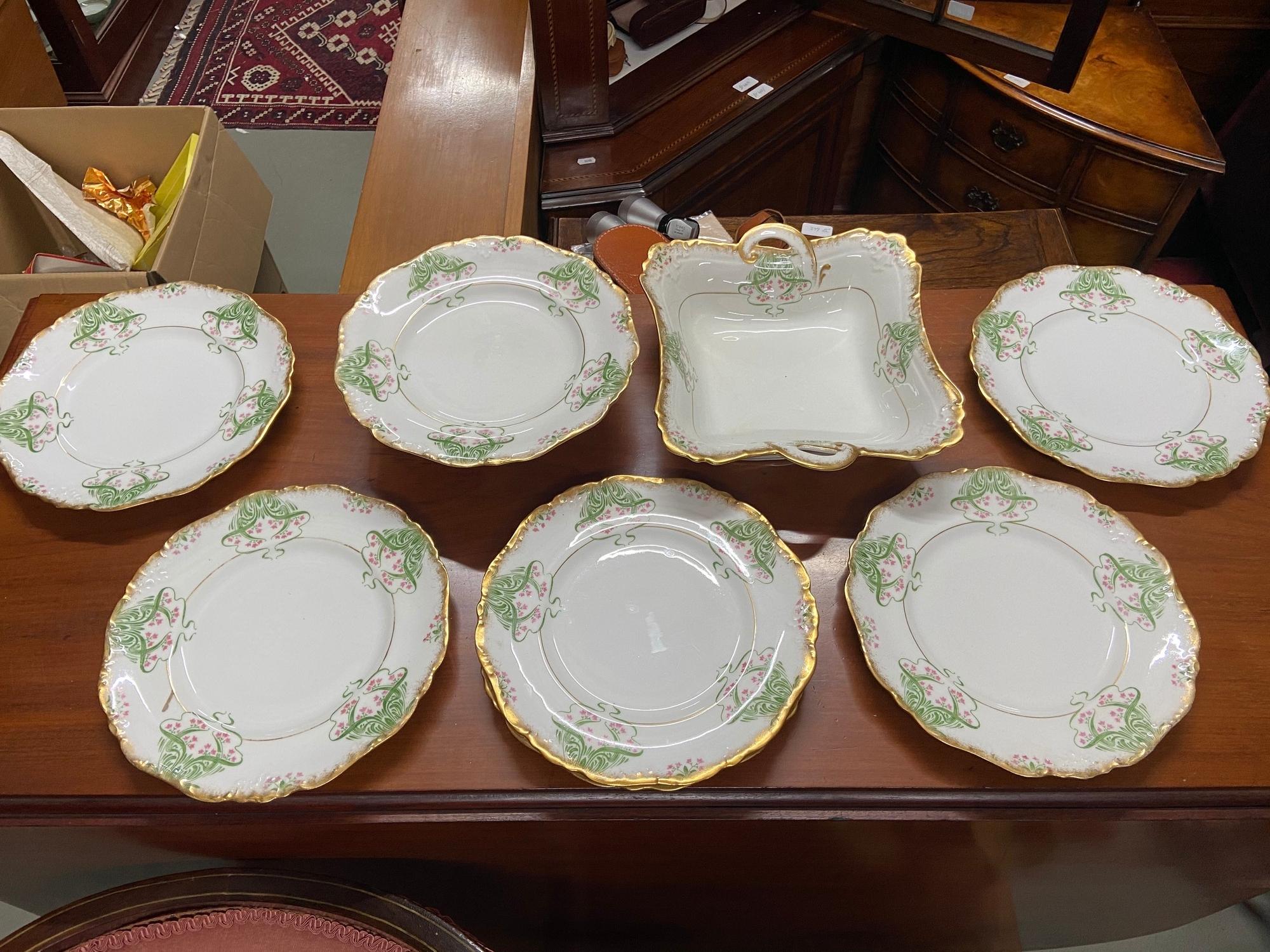 A Beautiful set of Maple & Co London Art Nouveau dinner service plates, tureen and tazza.