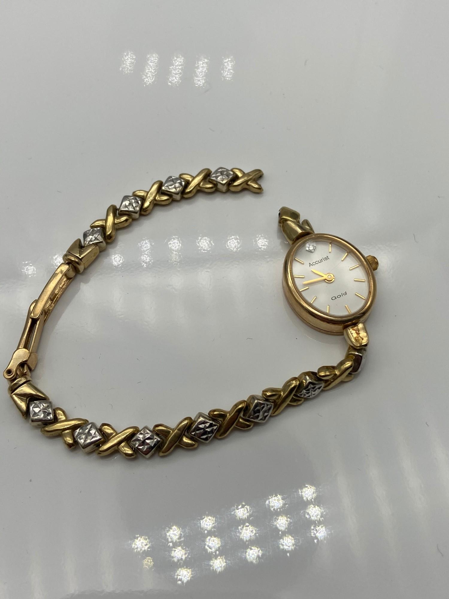 A Ladies 9ct gold Accurist Gold watch with 9ct gold bracelet. Bracelet link damaged. [12 grams]