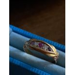 A Ladies 18ct gold diamond and pink stone ring.