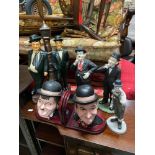 A Selection of Laurel and Hardy figurines and bookends. [Lamp post figurine is repaired]