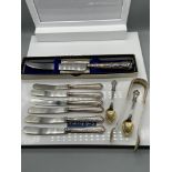A Quantity of Silver hallmarked flat wares which includes 6 Sheffield silver handle butter knives,