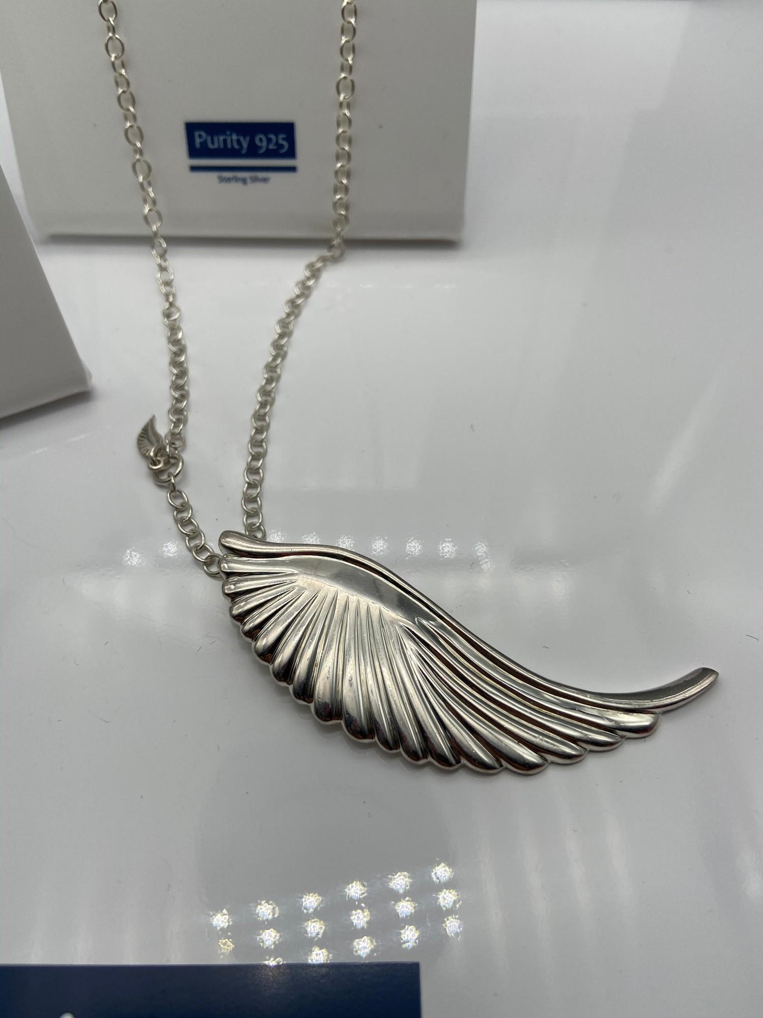 A 925 silver wing pendant and silver chain together with a pair of 925 silver heart shaped earrings. - Image 2 of 3