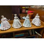 A Lot of four Royal Worcester lady figurines