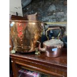 Arts and crafts brass and copper coal bucket together with a copper kettle