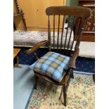 Antique spindle back arm chair.