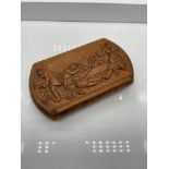 An 18th/ 19th century hand carved bur walnut tobacco/ snuff box. The lid is hand carved detailing