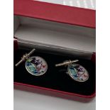 A Pair of 925 silver and enamel horse racing scene cufflinks with presentation box.