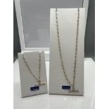 A 925 Silver curb chain necklace with fitted T-Bar together with a matching 925 silver bracelet. [
