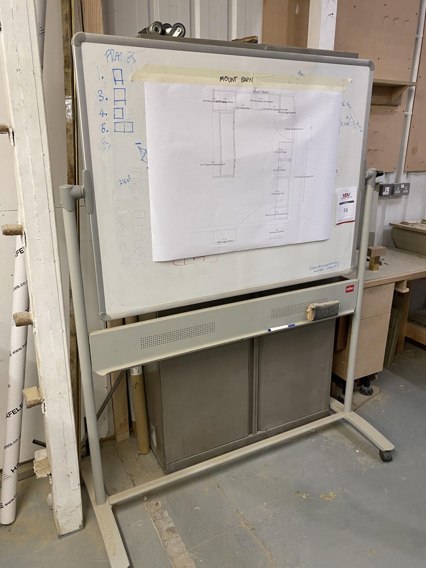 Whiteboard on frame, Metal Stationery Cabinet and Contents.