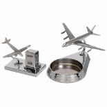 2 Desk Sets with Aeroplane Models1) Chromed metal, with day calendar, 5 x 2 ¾ x 4 ½ in. - And: 2)