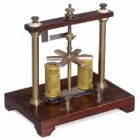 Early Electromagnetic Motor, c. 1860 With 2 electric magnets, mahogany base, overall size 7 x 5 x