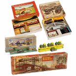 5 Mechanical Railway Toys, c. 1950Germany. Lithographed tin, all spring-driven, slightly damaged