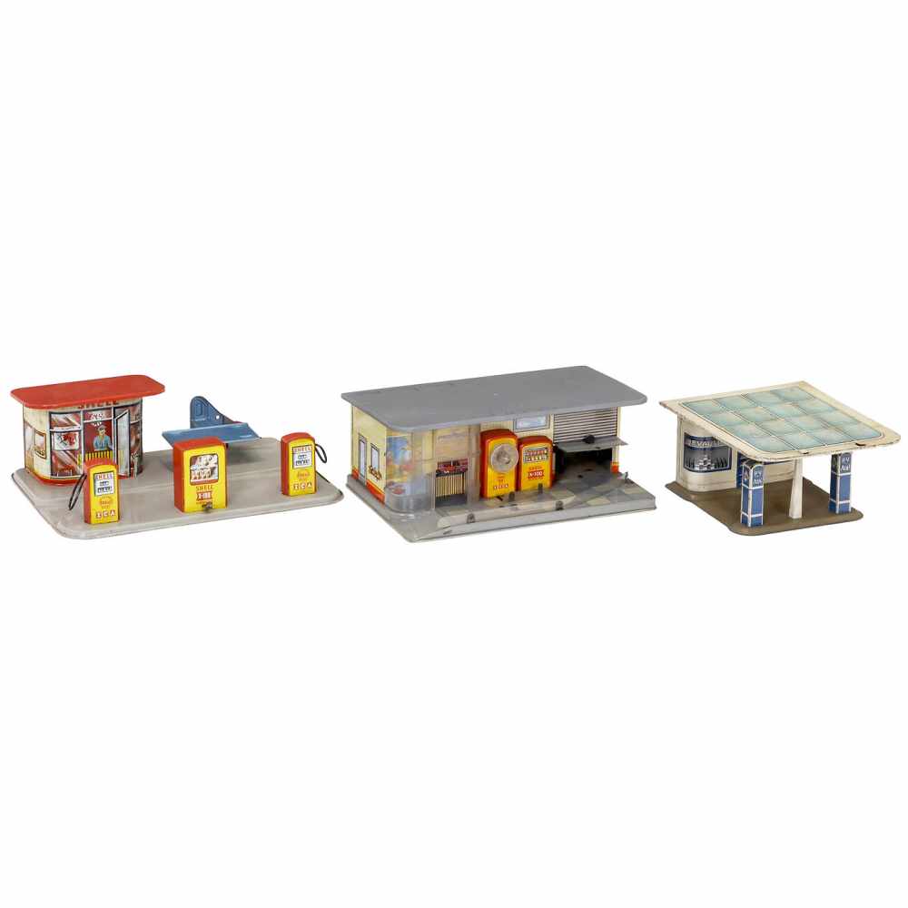 3 Tin-Toy Gas Stations, c. 19501) Gama, Shell, spring-motor (working), 9 x 6 in. - 2) Unmarked,