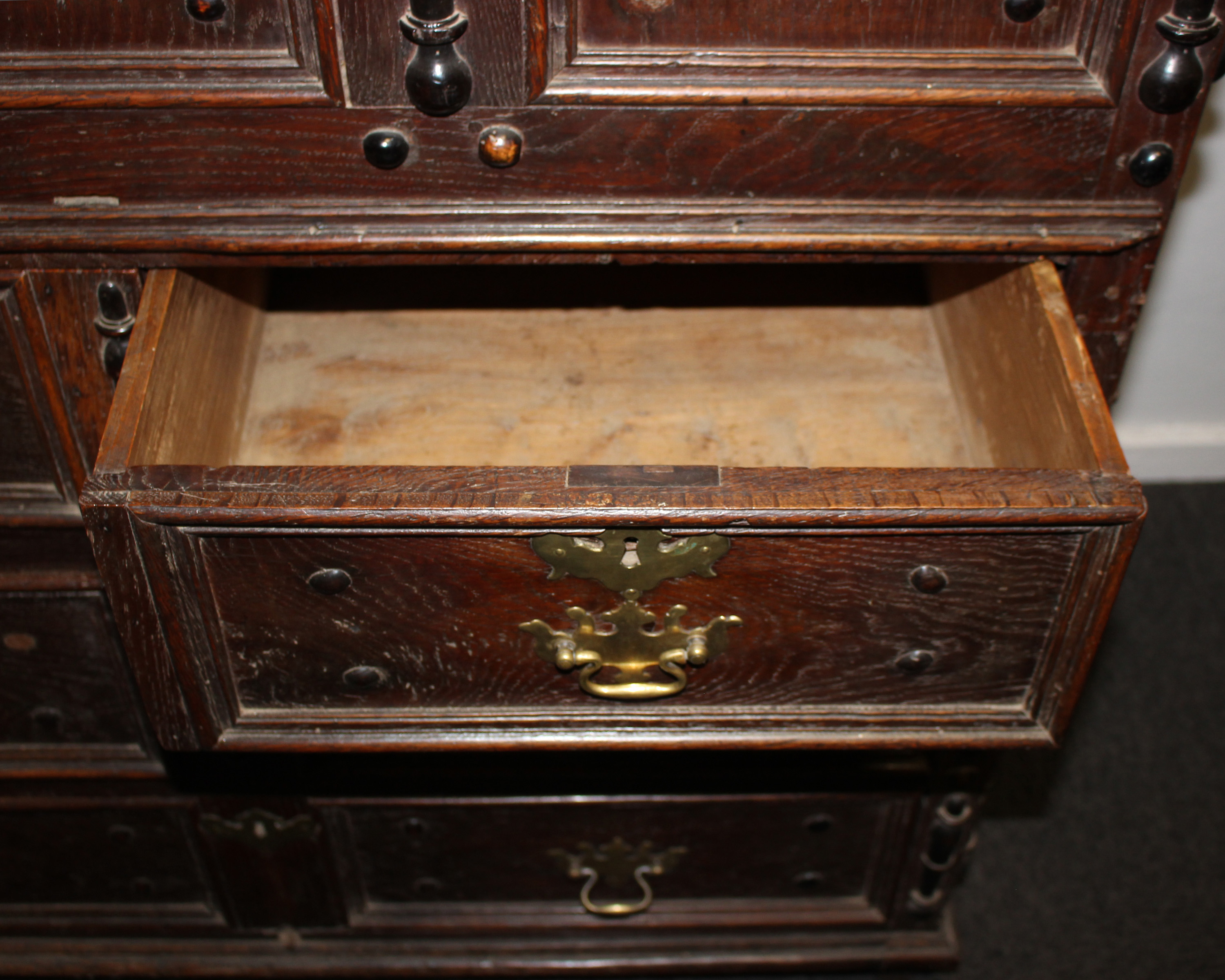 A late 17th century English joined oak coffer on chest. The top section with period paper lining - Image 3 of 4