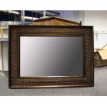 A modern wall mirror. Dimensions 110cm(H) x 81cm(W)