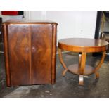 Side cabinet with cupboard and a shelf together with an art deco style circular table