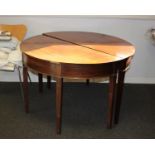 A pair of George 3rd mahogany 'D' end shaped table ends each on four square tapering