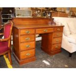 A late Victorian walnut twin pedestal desk with a gallery back.122cm(W) 76cm(H) 47cm(D)