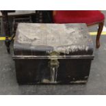 A vintage tin trunk.