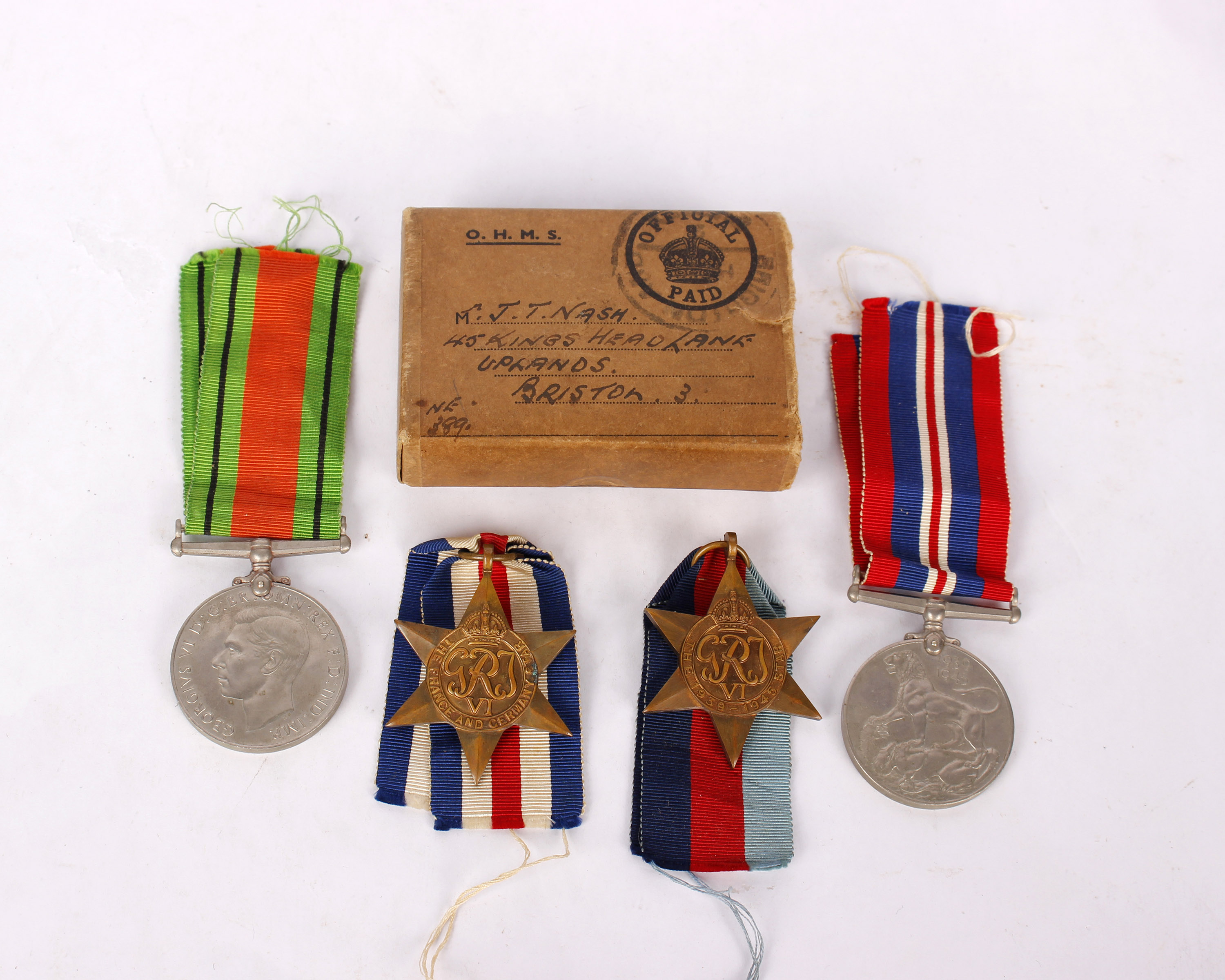 Four World War II medals.