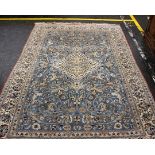 A large part silk Persian Nain Isfahan style carpet, central medallion and stylised birds and floral