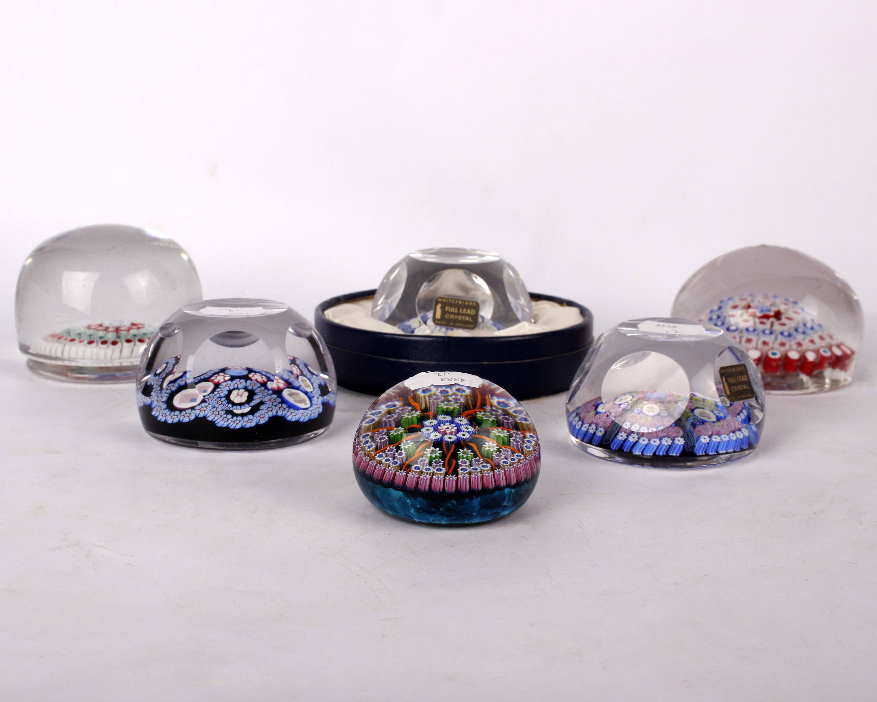 Three 19th Century large glass paperweights together with a Perthshire example and three modern