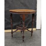 A mahogany hexagonal occasional table with galleried stretchers on turned legs. 68cm(h)